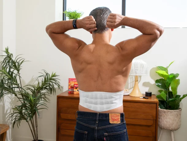 Man wearing ThermaCare back heatwrap