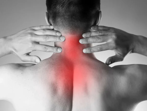 Man suffering from neck pain